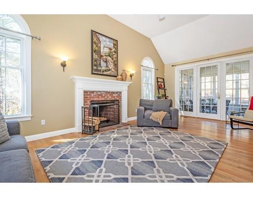 271 Sargent Road Boxborough, MA 01719 - Photo 9 of 29 a living room with furniture and a fireplace