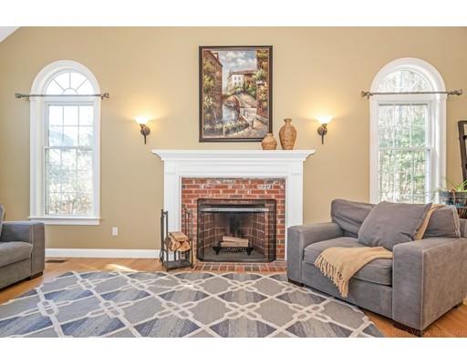 271 Sargent Road Boxborough, MA 01719 - Photo 10 of 29 a living room with furniture and a fireplace