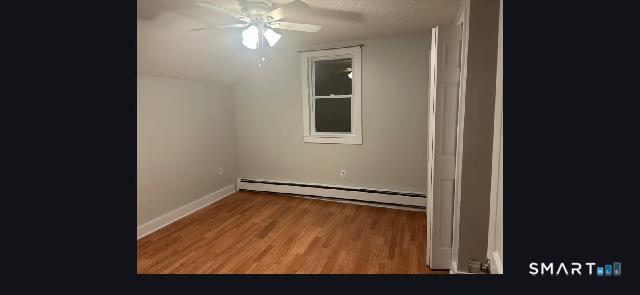 34 Rock Street Winchester, CT 06098 - Photo 12 of 20 a view of an empty room with a window