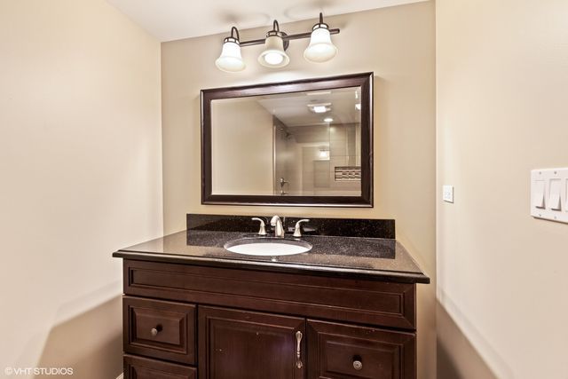 a view of a livingroom with furniture and lounge chair