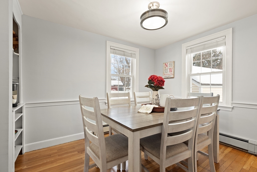 50 Forest Street Reading, MA 01867 - Photo 13 of 42 a dining room with furniture and window