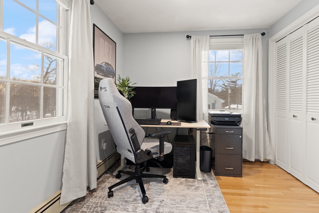 50 Forest Street Reading, MA 01867 - Photo 33 of 42 a view of a workspace with furniture and a window