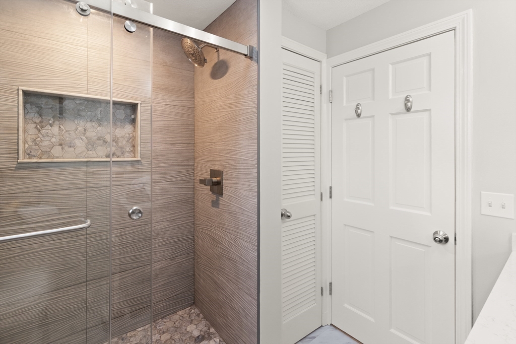 50 Forest Street Reading, MA 01867 - Photo 35 of 42 a view of bathroom with shower