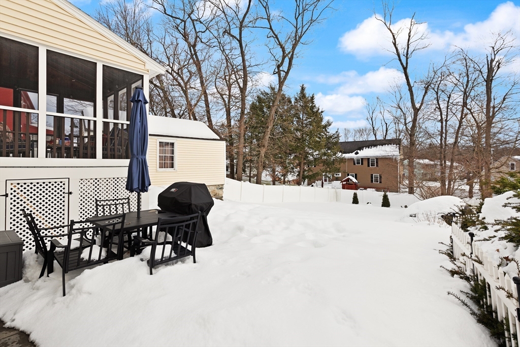 50 Forest Street Reading, MA 01867 - Photo 41 of 42 a view of a patio with a yard
