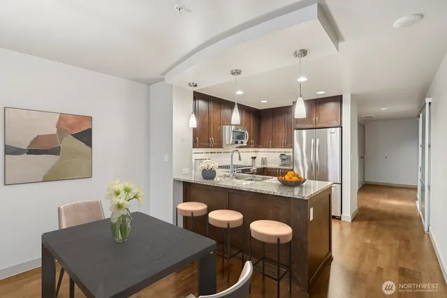 a view of a dining room with furniture window and outside view