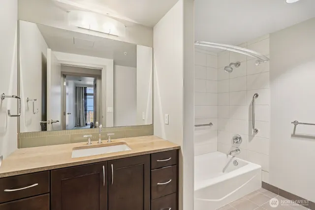 a bathroom with a bathtub and toilet