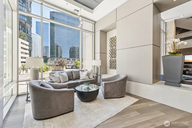 a view of a dining room with furniture window and wooden floor