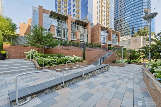 a view of a building with potted plants