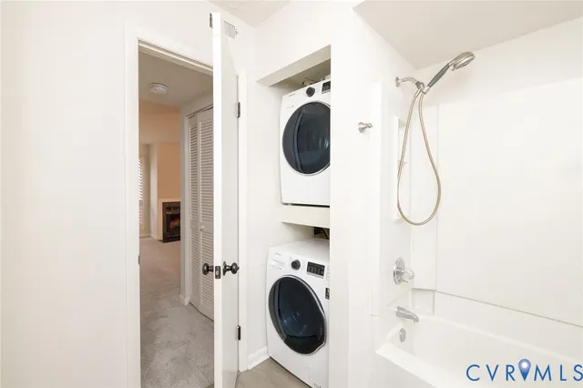 a bathroom with a washer and dryer