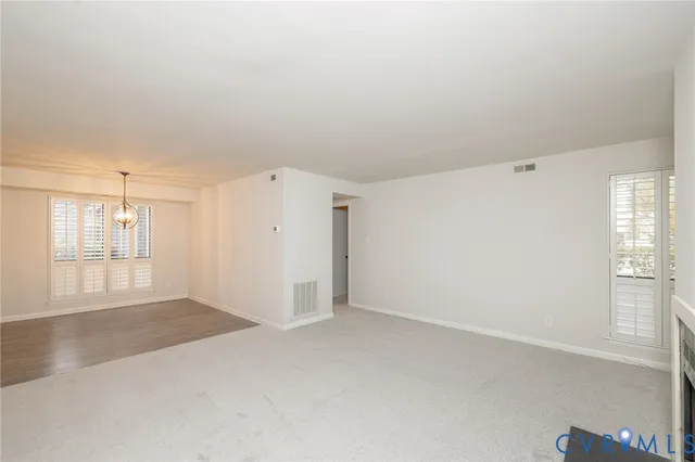 an empty room with windows