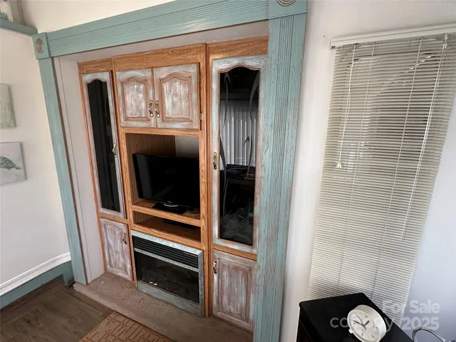 a view of hallway with washer and dryer