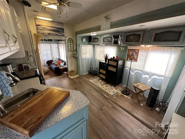 a view of a refrigerator sitting on the floor