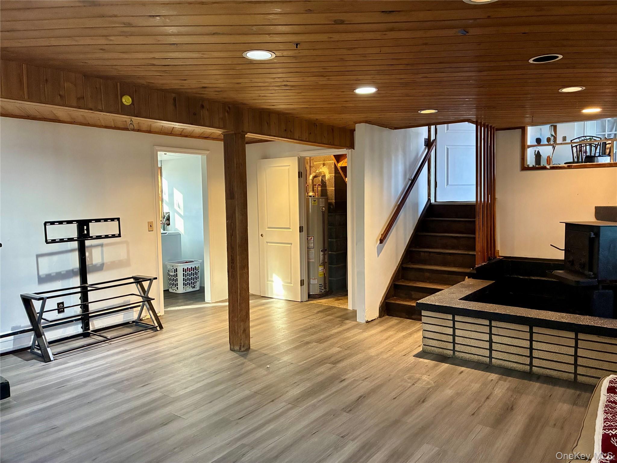 130 Scotland Hill Road Spring Valley, NY 10977 - Photo 11 of 25 View of Lower level family room off of kitchen with leads to laundry room and utility room