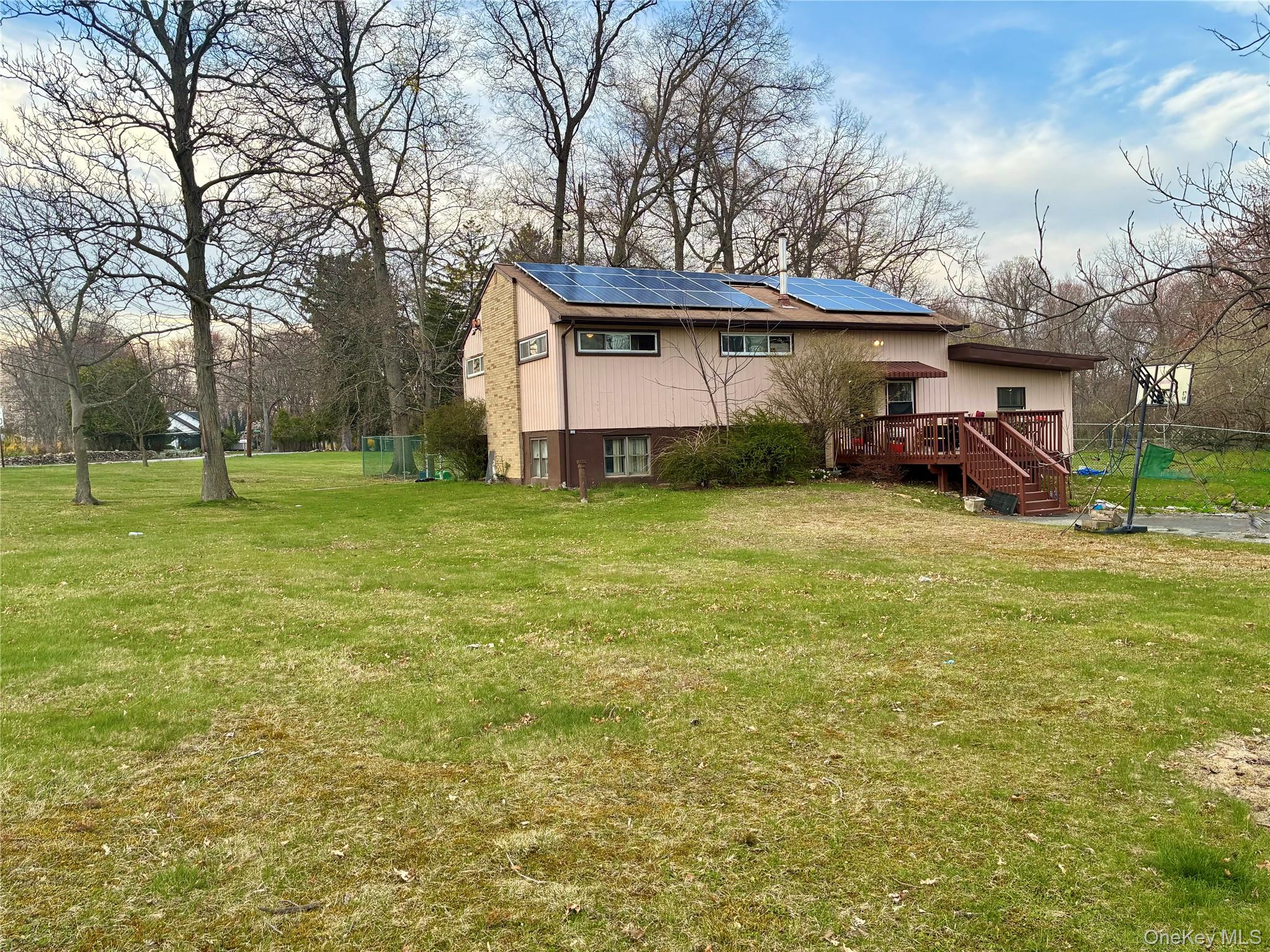 130 Scotland Hill Road Spring Valley, NY 10977 - Photo 24 of 25 Back deck off of kitchen and expansive yard
