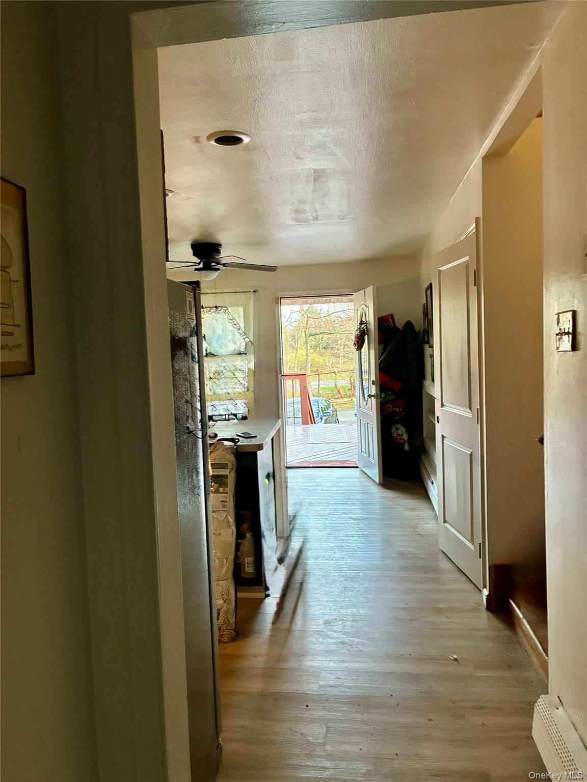 130 Scotland Hill Road Spring Valley, NY 10977 - Photo 3 of 25 Main entry with full bath to the left kitchen with deck straight ahead