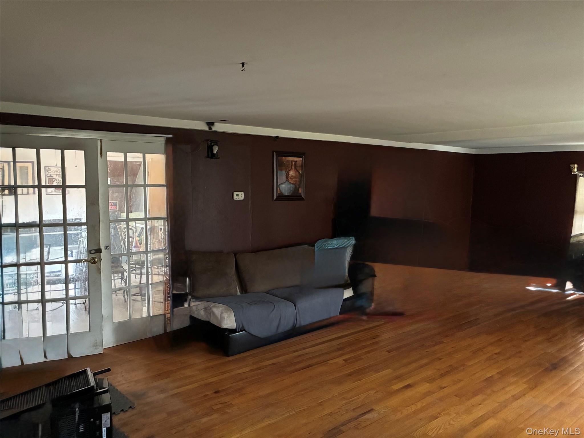 130 Scotland Hill Road Spring Valley, NY 10977 - Photo 8 of 25 Oversized living room with double door leading back to kitchen