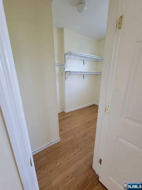 199 Van Winkle Street, Unit 2 East Rutherford, NJ 07073 - Photo 12 of 22 a view of empty room with wooden floor