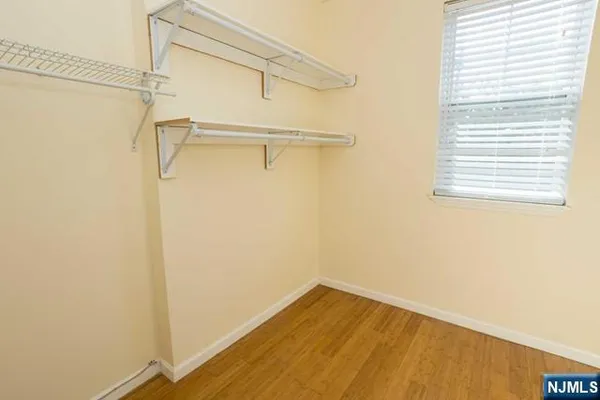 a view of a room with racks on the wall