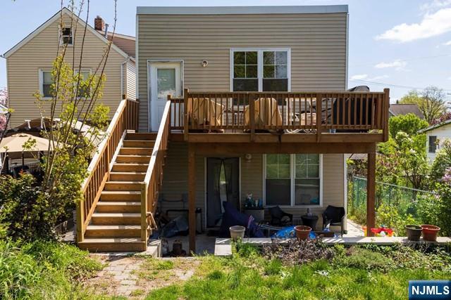 199 Van Winkle Street, Unit 2 East Rutherford, NJ 07073 - Photo 20 of 22 a front view of a house with entryway and stairs