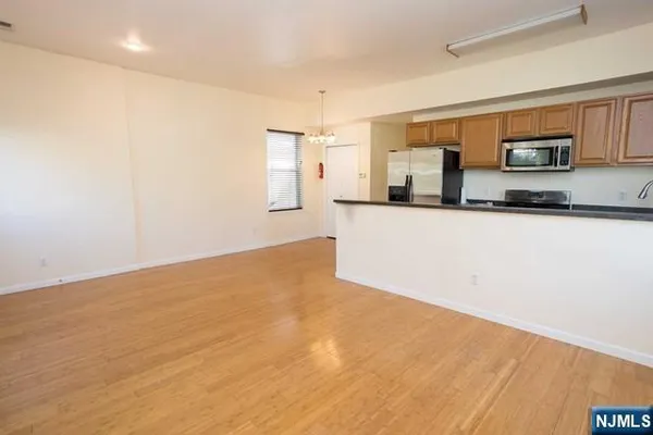 a view of a kitchen with a sink