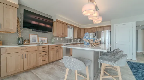 a room with a bed and a mirror