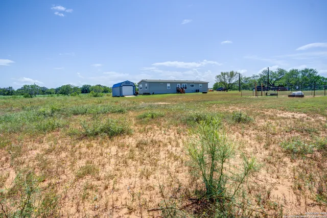 a view of an outdoor space and a yard
