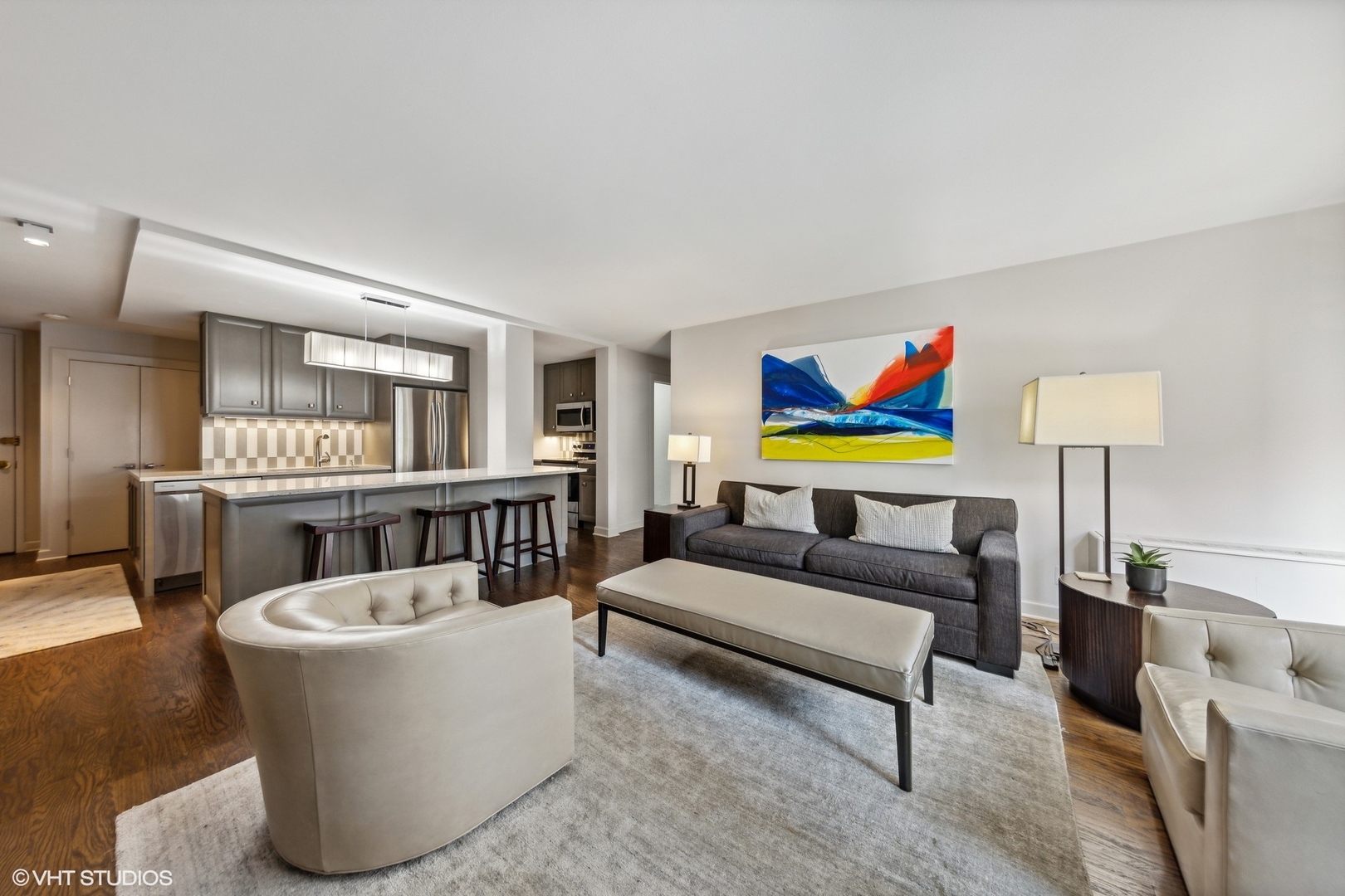 21 West Goethe Street, Unit 8DE Chicago, IL 60610 - Photo 3 of 22 a living room with furniture and a lamp