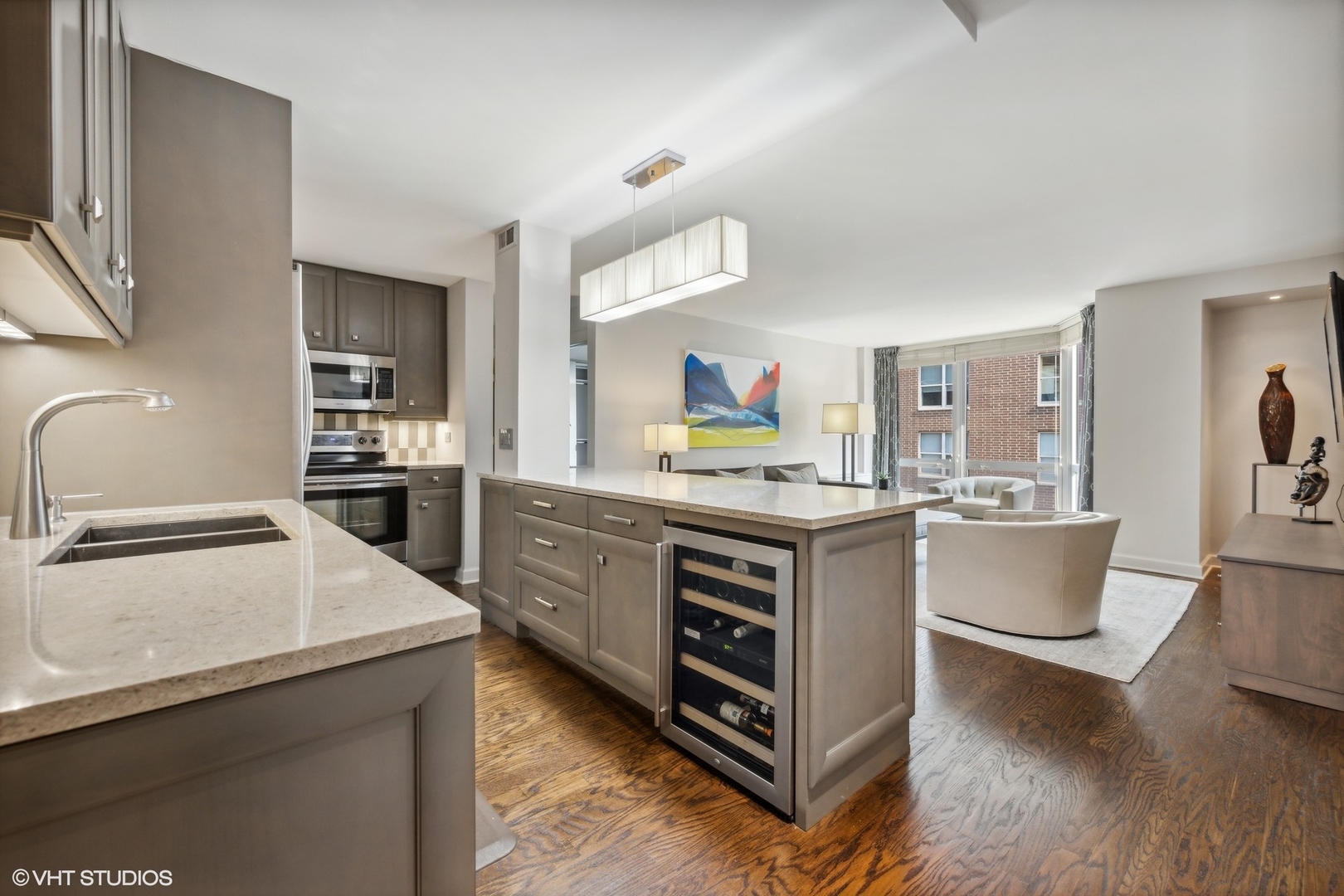 21 West Goethe Street, Unit 8DE Chicago, IL 60610 - Photo 4 of 22 a kitchen with counter top space and stainless steel appliances
