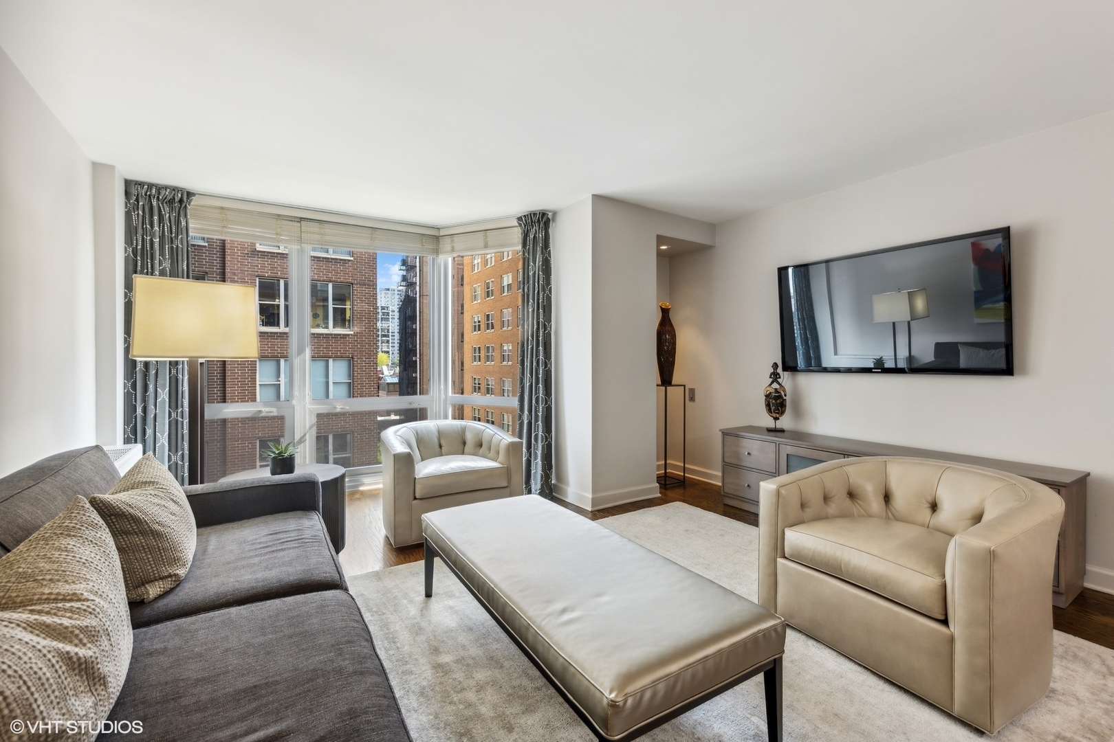 21 West Goethe Street, Unit 8DE Chicago, IL 60610 - Photo 8 of 22 a living room with furniture and a couch