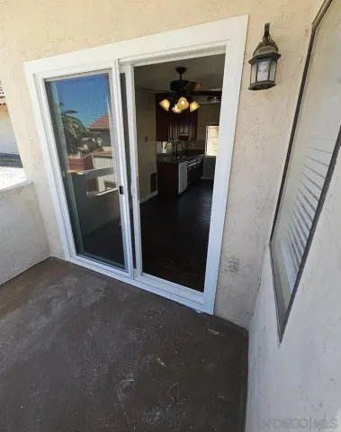 a view of a hallway view with staircase