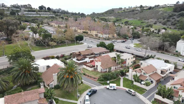 an aerial view of multiple house with outdoor space