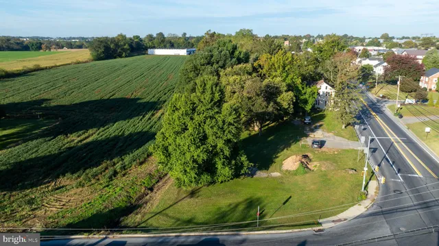 a view of a lake with a yard
