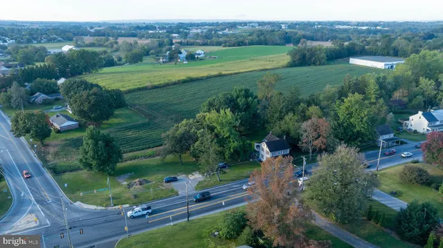 a view of a lake with a yard