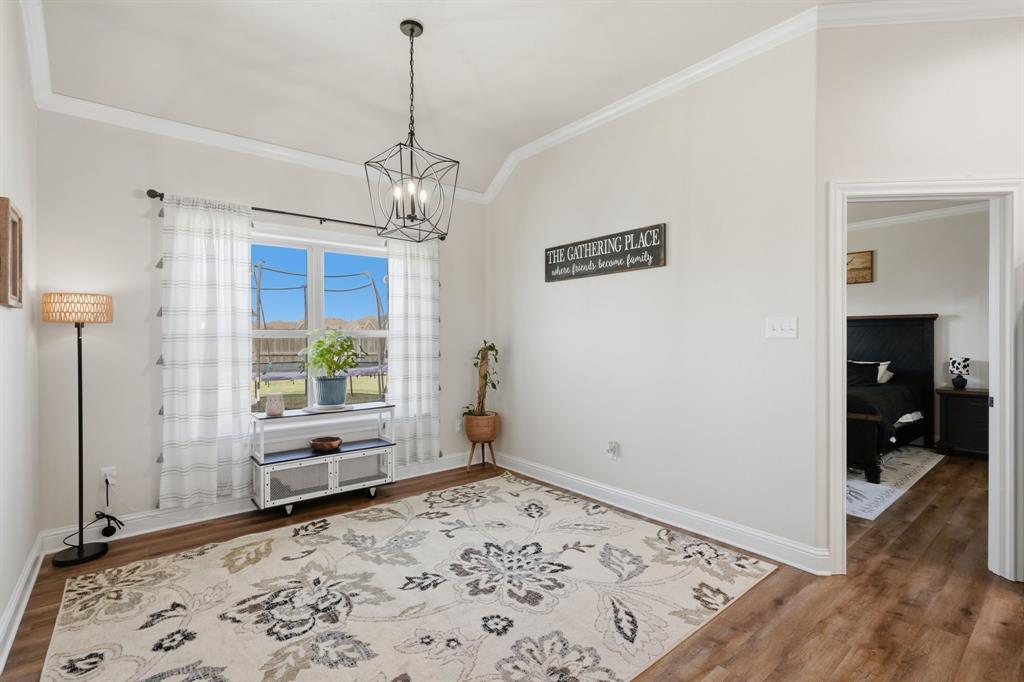 3302 Shelby Road Abilene, TX 79606 - Photo 11 of 29 a view of a bedroom with furniture and windows