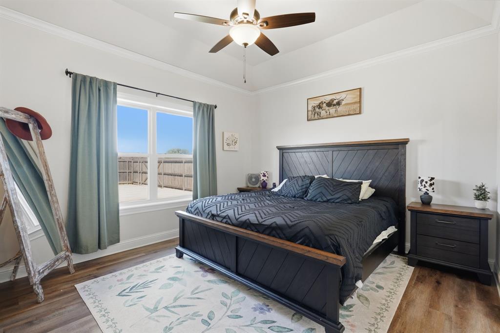 3302 Shelby Road Abilene, TX 79606 - Photo 13 of 29 a bedroom with a bed and a window