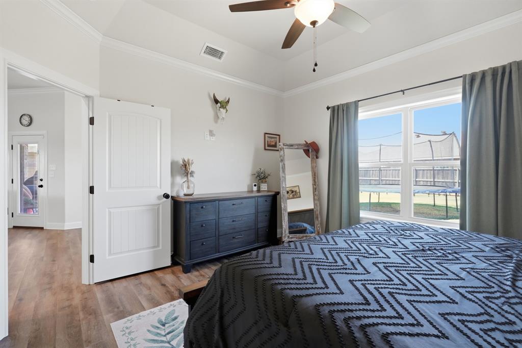 3302 Shelby Road Abilene, TX 79606 - Photo 15 of 29 a bedroom with a bed and a window