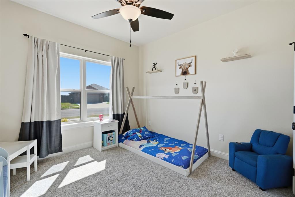 3302 Shelby Road Abilene, TX 79606 - Photo 18 of 29 a living room with furniture and a window