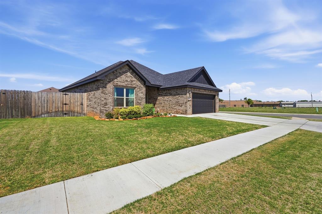 3302 Shelby Road Abilene, TX 79606 - Photo 2 of 29 a front view of house with yard and green space
