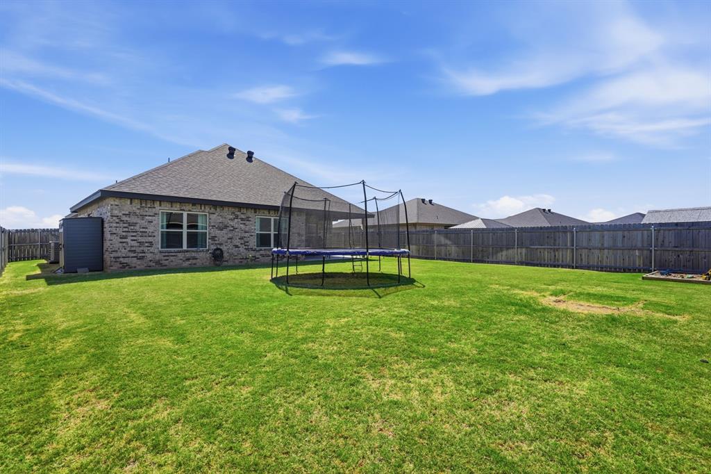 3302 Shelby Road Abilene, TX 79606 - Photo 26 of 29 a view of a house with a backyard