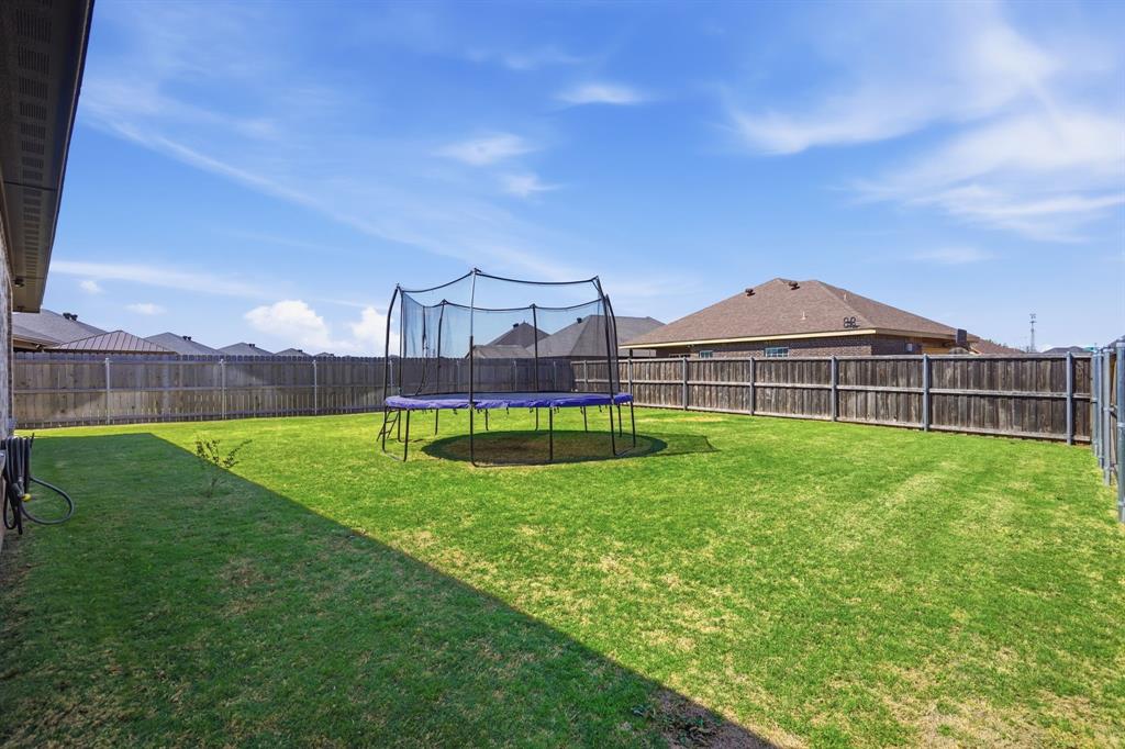 3302 Shelby Road Abilene, TX 79606 - Photo 27 of 29 a view of yard with swimming pool and brick wall