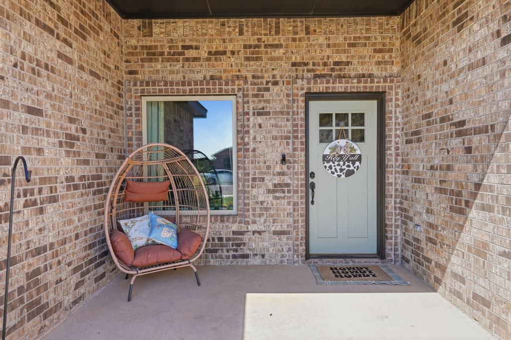 3302 Shelby Road Abilene, TX 79606 - Photo 3 of 29 a front view of a house with entryway