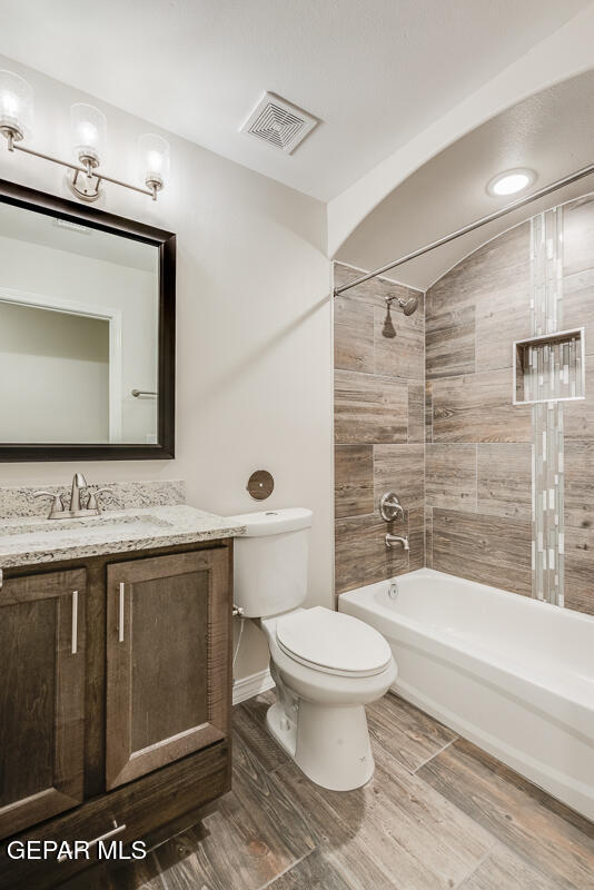 6060 Summer Ridge Santa Teresa, NM 88008 - Photo 15 of 25 a bathroom with a toilet sink and a mirror