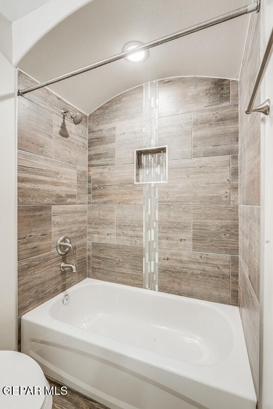 6060 Summer Ridge Santa Teresa, NM 88008 - Photo 16 of 25 a bathroom with a white bathtub and a shower