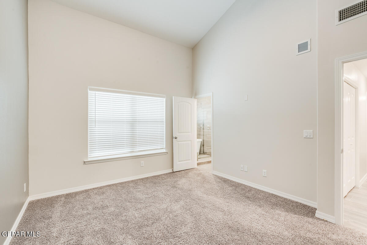 6060 Summer Ridge Santa Teresa, NM 88008 - Photo 20 of 25 an empty room with a empty space and windows