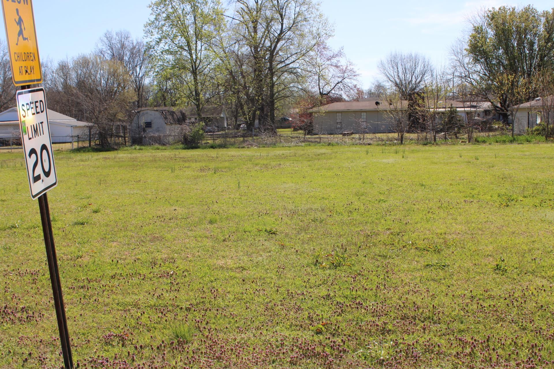 328 Robin Drive Ripley, TN 38063 - Photo 1 of 7 a view of a swimming pool with an outdoor space and seating area