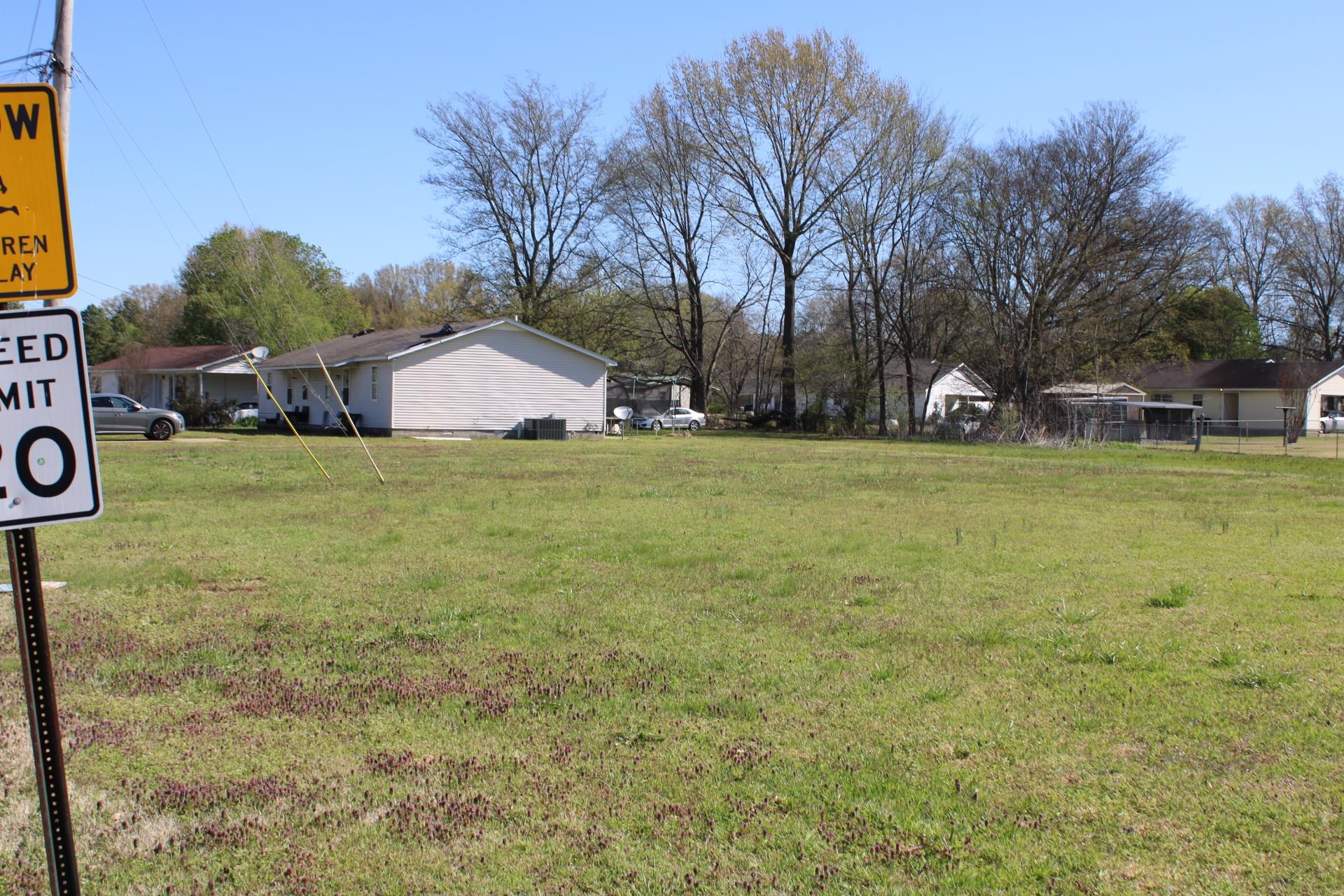 328 Robin Drive Ripley, TN 38063 - Photo 3 of 7 a view of a house with a yard and garage