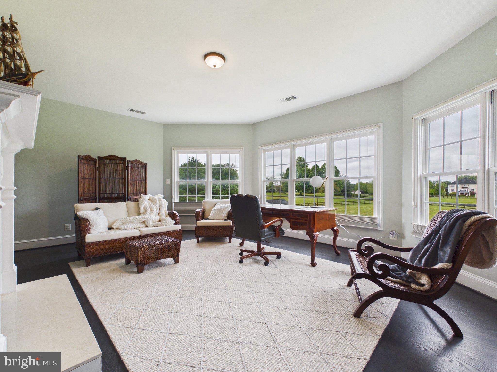 38565 Piggott Bottom Road Hamilton, VA 20158 - Photo 41 of 85 a living room with furniture and a large window