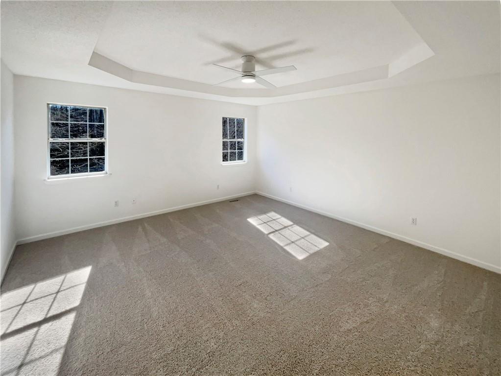 180 Honeysuckle Drive Southeast Calhoun, GA 30701 - Photo 11 of 21 an empty room with windows