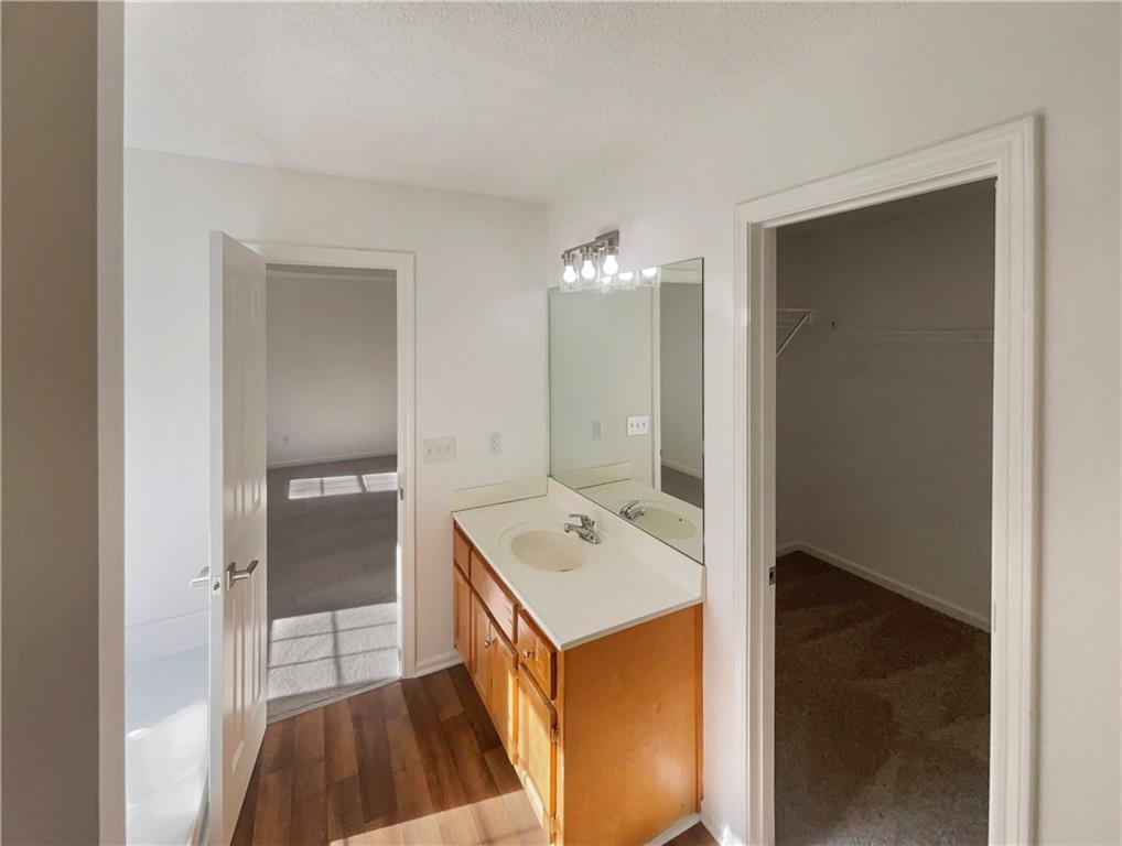 180 Honeysuckle Drive Southeast Calhoun, GA 30701 - Photo 15 of 21 a bathroom with a sink a toilet and shower