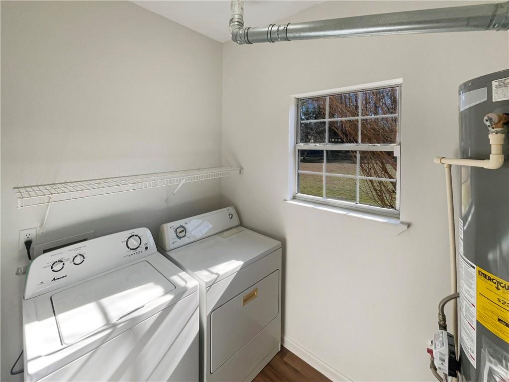 180 Honeysuckle Drive Southeast Calhoun, GA 30701 - Photo 17 of 21 a utility room with dryer and washer
